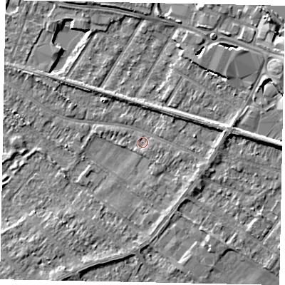 Shaded relief map of the ground around TW183DE, computed from Environment Agency LiDAR. The ground here sits at about 14 m above sea level and falls 6 m across the surrounding 800 m. Surface water reaching this point runs off ground lying to the south-east, 1.0 m higher.