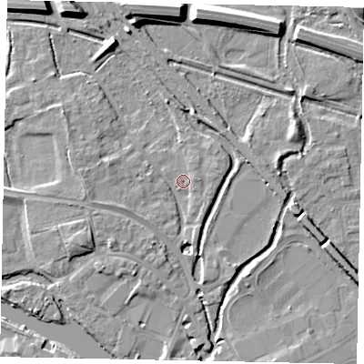 Shaded relief map of the ground around TW184AS, computed from Environment Agency LiDAR. The ground here sits at about 16 m above sea level and falls 13 m across the surrounding 800 m. Surface water reaching this point runs off ground lying to the west, 2.4 m higher.
