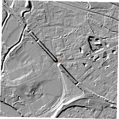 Shaded relief map of the ground around TW184BY, computed from Environment Agency LiDAR. The ground here sits at about 16 m above sea level and falls 11 m across the surrounding 800 m. Surface water reaching this point runs off ground lying to the south, 5.4 m higher.