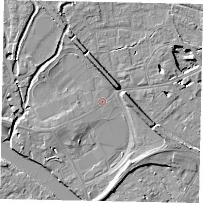Shaded relief map of the ground around TW184DP, computed from Environment Agency LiDAR. The ground here sits at about 16 m above sea level and falls 11 m across the surrounding 800 m. Surface water reaching this point runs off ground lying to the north, 4.8 m higher.