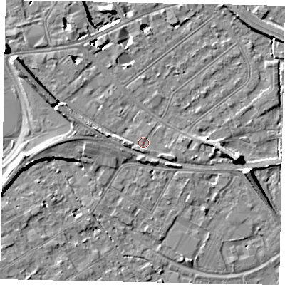 Shaded relief map of the ground around TW184LY, computed from Environment Agency LiDAR. The ground here sits at about 16 m above sea level and falls 11 m across the surrounding 800 m. Surface water reaching this point runs off ground lying to the south, 1.4 m higher.