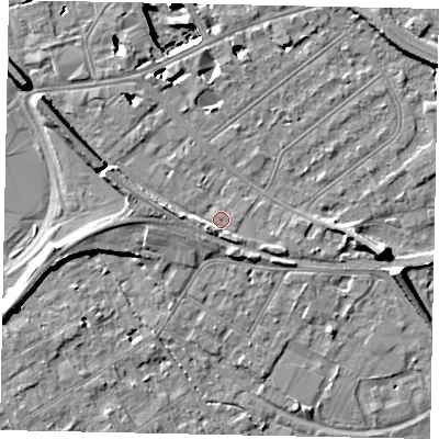 Shaded relief map of the ground around TW184LZ, computed from Environment Agency LiDAR. The ground here sits at about 16 m above sea level and falls 11 m across the surrounding 800 m. Surface water reaching this point runs off ground lying to the west-north-west, 3.9 m higher.