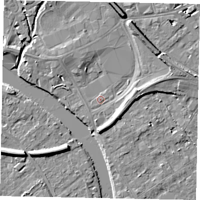 Shaded relief map of the ground around TW184PR, computed from Environment Agency LiDAR. The ground here sits at about 15 m above sea level and falls 9 m across the surrounding 800 m. Surface water reaching this point runs off ground lying to the north-north-east, 5.8 m higher.
