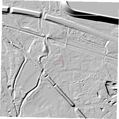 Shaded relief map of the ground around TW184RL, computed from Environment Agency LiDAR. The ground here sits at about 16 m above sea level and falls 22 m across the surrounding 800 m. Surface water reaching this point runs off ground lying to the west, 1.0 m higher.