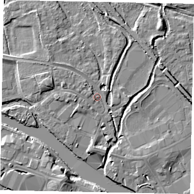 Shaded relief map of the ground around TW184XP, computed from Environment Agency LiDAR. The ground here sits at about 16 m above sea level and falls 7 m across the surrounding 800 m. Surface water reaching this point runs off ground lying to the north-west, 3.4 m higher.