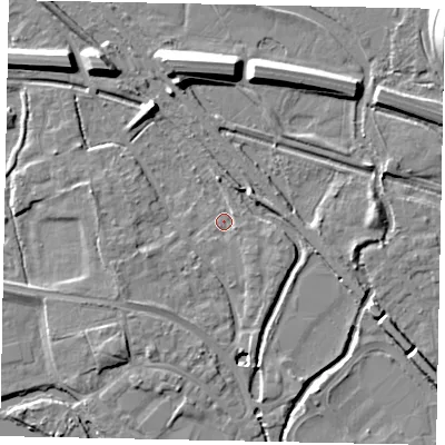 Shaded relief map of the ground around TW184YR, computed from Environment Agency LiDAR. The ground here sits at about 16 m above sea level and falls 13 m across the surrounding 800 m. Surface water reaching this point runs off ground lying to the south-east, 2.2 m higher.