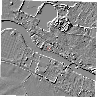 Shaded relief map of the ground around TW195AS, computed from Environment Agency LiDAR. The ground here sits at about 15 m above sea level and falls 9 m across the surrounding 800 m. Surface water reaching this point runs off ground lying to the north-west, 3.6 m higher.