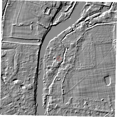Shaded relief map of the ground around TW195JS, computed from Environment Agency LiDAR. The ground here sits at about 16 m above sea level and falls 4 m across the surrounding 800 m. Surface water reaching this point runs off ground lying to the south, 1.6 m higher.