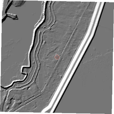 Shaded relief map of the ground around TW195NR, computed from Environment Agency LiDAR. The ground here sits at about 18 m above sea level and falls 17 m across the surrounding 800 m. Surface water reaching this point runs off ground lying to the north-east, 0.9 m higher.