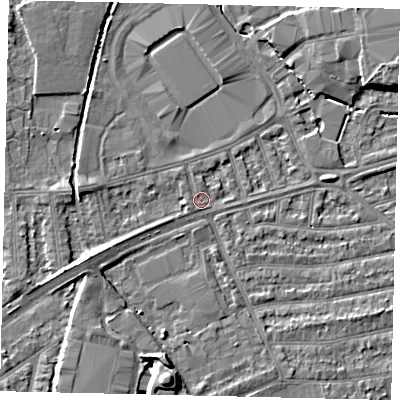 Shaded relief map of the ground around TW27RA, computed from Environment Agency LiDAR. The ground here sits at about 9 m above sea level and falls 7 m across the surrounding 800 m. Surface water reaching this point runs off ground lying to the north-west, 4.2 m higher.