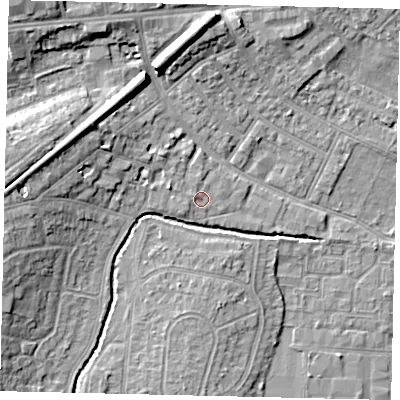 Shaded relief map of the ground around TW76PD, computed from Environment Agency LiDAR. The ground here sits at about 9 m above sea level and falls 11 m across the surrounding 800 m. Surface water reaching this point runs off ground lying to the west-north-west, 1.0 m higher.