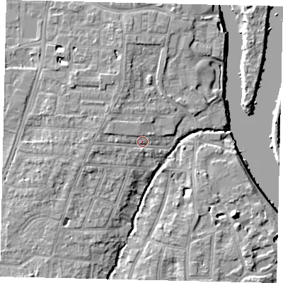 Shaded relief map of the ground around TW77HB, computed from Environment Agency LiDAR. The ground here sits at about 7 m above sea level and falls 10 m across the surrounding 800 m. Surface water reaching this point runs off ground lying to the west-north-west, 2.3 m higher.