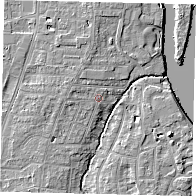 Shaded relief map of the ground around TW77HG, computed from Environment Agency LiDAR. The ground here sits at about 7 m above sea level and falls 10 m across the surrounding 800 m. Surface water reaching this point runs off ground lying to the west-north-west, 2.3 m higher.