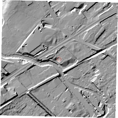 Shaded relief map of the ground around TW89GX, computed from Environment Agency LiDAR. The ground here sits at about 9 m above sea level and falls 12 m across the surrounding 800 m. Surface water reaching this point runs off ground lying to the north-west, 3.5 m higher.