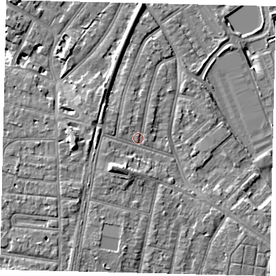 Shaded relief map of the ground around TW94DB, computed from Environment Agency LiDAR. The ground here sits at about 7 m above sea level and falls 11 m across the surrounding 800 m. Surface water reaching this point runs off ground lying to the south-west, 5.1 m higher.