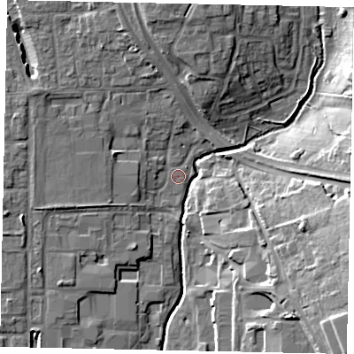 Shaded relief map of the ground around UB100AJ, computed from Environment Agency LiDAR. The ground here sits at about 33 m above sea level and falls 17 m across the surrounding 800 m. Surface water reaching this point runs off ground lying to the north-north-west, 7.3 m higher.