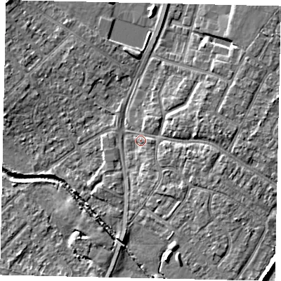 Shaded relief map of the ground around UB49BB, computed from Environment Agency LiDAR. The ground here sits at about 31 m above sea level and falls 6 m across the surrounding 800 m. Surface water reaching this point runs off ground lying to the east-north-east, 2.7 m higher.