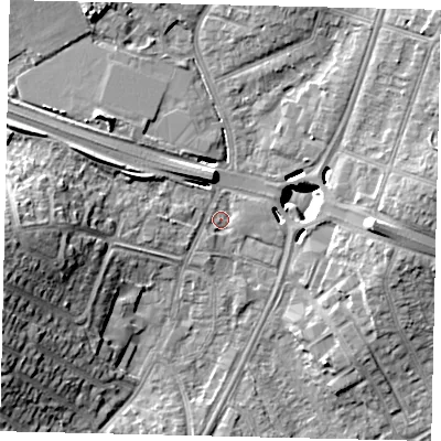 Shaded relief map of the ground around UB69JS, computed from Environment Agency LiDAR. The ground here sits at about 18 m above sea level and falls 18 m across the surrounding 800 m. Surface water reaching this point runs off ground lying to the west, 17.3 m higher.