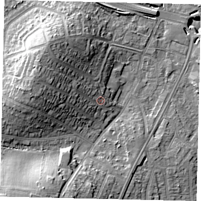 Shaded relief map of the ground around UB69LW, computed from Environment Agency LiDAR. The ground here sits at about 21 m above sea level and falls 21 m across the surrounding 800 m. Surface water reaching this point runs off ground lying to the west-north-west, 8.2 m higher.