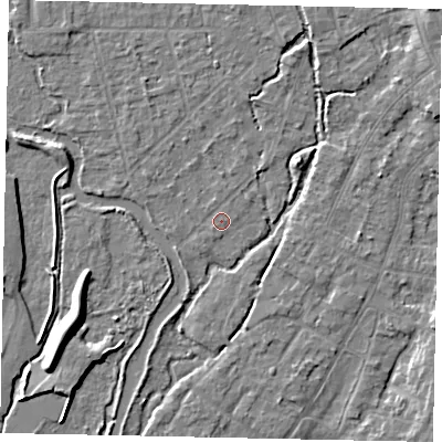 Shaded relief map of the ground around UB77AG, computed from Environment Agency LiDAR. The ground here sits at about 25 m above sea level and falls 7 m across the surrounding 800 m. Surface water reaching this point runs off ground lying to the north-east, 0.7 m higher.