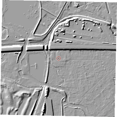 Shaded relief map of the ground around UB77AP, computed from Environment Agency LiDAR. The ground here sits at about 26 m above sea level and falls 11 m across the surrounding 800 m. Surface water reaching this point runs off ground lying to the north, 5.8 m higher.