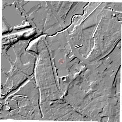 Shaded relief map of the ground around UB77FP, computed from Environment Agency LiDAR. The ground here sits at about 29 m above sea level and falls 8 m across the surrounding 800 m. Surface water reaching this point runs off ground lying to the east-north-east, 4.5 m higher.