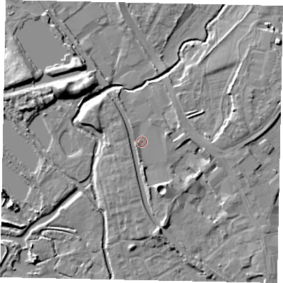 Shaded relief map of the ground around UB77FQ, computed from Environment Agency LiDAR. The ground here sits at about 29 m above sea level and falls 8 m across the surrounding 800 m. Surface water reaching this point runs off ground lying to the south-south-east, 4.3 m higher.