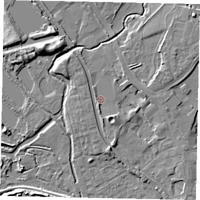 Shaded relief map of the ground around UB77FT, computed from Environment Agency LiDAR. The ground here sits at about 29 m above sea level and falls 9 m across the surrounding 800 m. Surface water reaching this point runs off ground lying to the east-north-east, 4.5 m higher.