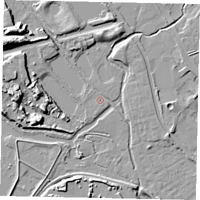 Shaded relief map of the ground around UB77GL, computed from Environment Agency LiDAR. The ground here sits at about 28 m above sea level and falls 17 m across the surrounding 800 m. Surface water reaching this point runs off ground lying to the north-north-west, 6.1 m higher.