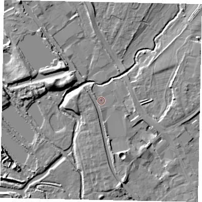 Shaded relief map of the ground around UB77GN, computed from Environment Agency LiDAR. The ground here sits at about 29 m above sea level and falls 8 m across the surrounding 800 m. Surface water reaching this point runs off ground lying to the south-south-east, 4.3 m higher.