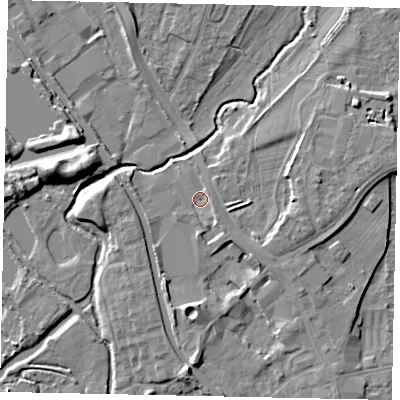Shaded relief map of the ground around UB77QP, computed from Environment Agency LiDAR. The ground here sits at about 29 m above sea level and falls 8 m across the surrounding 800 m. Surface water reaching this point runs off ground lying to the south-east, 2.5 m higher.