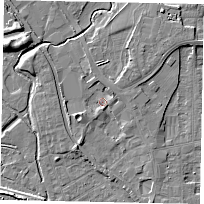 Shaded relief map of the ground around UB77TR, computed from Environment Agency LiDAR. The ground here sits at about 29 m above sea level and falls 8 m across the surrounding 800 m. Surface water reaching this point runs off ground lying to the north-east, 4.7 m higher.