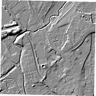 Shaded relief map of the ground around UB77XL, computed from Environment Agency LiDAR. The ground here sits at about 29 m above sea level and falls 8 m across the surrounding 800 m. Surface water reaching this point runs off ground lying to the east-north-east, 2.5 m higher.