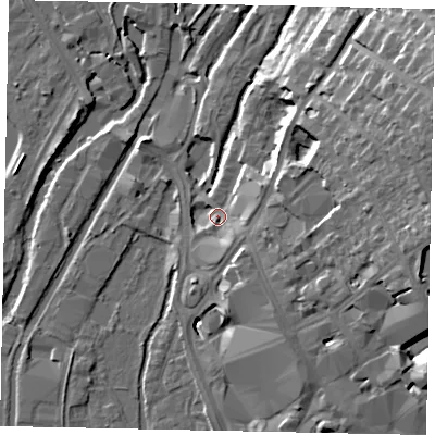 Shaded relief map of the ground around UB81JR, computed from Environment Agency LiDAR. The ground here sits at about 36 m above sea level and falls 24 m across the surrounding 800 m. Surface water reaching this point runs off ground lying to the east, 18.3 m higher.