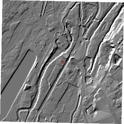 Shaded relief map of the ground around UB81WN, computed from Environment Agency LiDAR. The ground here sits at about 33 m above sea level and falls 15 m across the surrounding 800 m. Surface water reaching this point runs off ground lying to the south-south-west, 2.2 m higher.