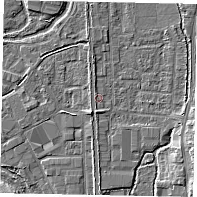 Shaded relief map of the ground around UB82GT, computed from Environment Agency LiDAR. The ground here sits at about 32 m above sea level and falls 7 m across the surrounding 800 m. Surface water reaching this point runs off ground lying to the south, 3.9 m higher.
