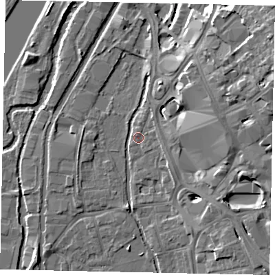 Shaded relief map of the ground around UB82TW, computed from Environment Agency LiDAR. The ground here sits at about 33 m above sea level and falls 18 m across the surrounding 800 m. Surface water reaching this point runs off ground lying to the east-north-east, 15.2 m higher.