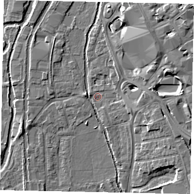 Shaded relief map of the ground around UB82TX, computed from Environment Agency LiDAR. The ground here sits at about 33 m above sea level and falls 17 m across the surrounding 800 m. Surface water reaching this point runs off ground lying to the north-east, 15.9 m higher.