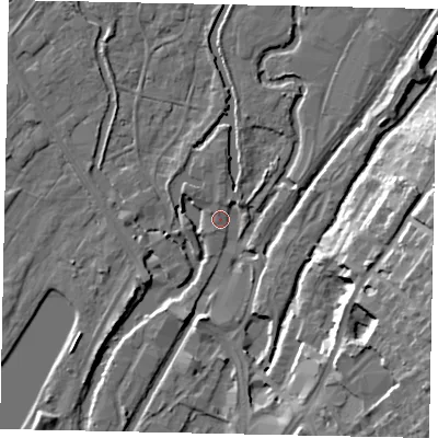 Shaded relief map of the ground around UB94BT, computed from Environment Agency LiDAR. The ground here sits at about 33 m above sea level and falls 18 m across the surrounding 800 m. Surface water reaching this point runs off ground lying to the north, 1.8 m higher.