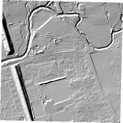 Shaded relief map of the ground around W130FJ, computed from Environment Agency LiDAR. The ground here sits at about 18 m above sea level and falls 14 m across the surrounding 800 m. Surface water reaching this point runs off ground lying to the south-east, 9.1 m higher.