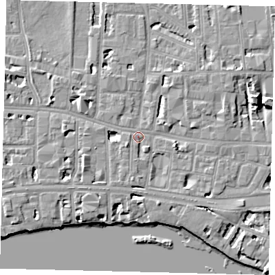 Shaded relief map of the ground around W69JX, computed from Environment Agency LiDAR. The ground here sits at about 5 m above sea level and falls 7 m across the surrounding 800 m. Surface water reaching this point runs off ground lying to the east-south-east, 5.0 m higher.