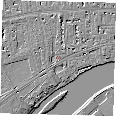 Shaded relief map of the ground around W69NP, computed from Environment Agency LiDAR. The ground here sits at about 6 m above sea level and falls 6 m across the surrounding 800 m. Surface water reaching this point runs off ground lying to the north, 4.1 m higher.