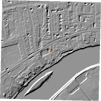 Shaded relief map of the ground around W69TR, computed from Environment Agency LiDAR. The ground here sits at about 5 m above sea level and falls 7 m across the surrounding 800 m. Surface water reaching this point runs off ground lying to the north, 4.4 m higher.