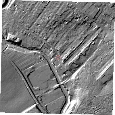 Shaded relief map of the ground around W72BA, computed from Environment Agency LiDAR. The ground here sits at about 12 m above sea level and falls 15 m across the surrounding 800 m. Surface water reaching this point runs off ground lying to the north-north-east, 11.4 m higher.