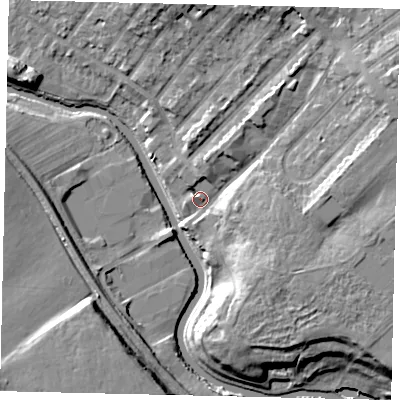 Shaded relief map of the ground around W72QN, computed from Environment Agency LiDAR. The ground here sits at about 12 m above sea level and falls 17 m across the surrounding 800 m. Surface water reaching this point runs off ground lying to the east-north-east, 12.0 m higher.