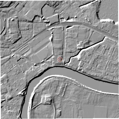 Shaded relief map of the ground around WA12DR, computed from Environment Agency LiDAR. The ground here sits at about 9 m above sea level and falls 7 m across the surrounding 800 m. Surface water reaching this point runs off ground lying to the north-north-west, 1.1 m higher.