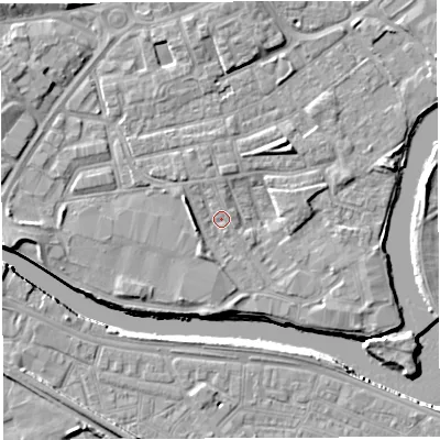 Shaded relief map of the ground around WA12JR, computed from Environment Agency LiDAR. The ground here sits at about 7 m above sea level and falls 7 m across the surrounding 800 m. Surface water reaching this point runs off ground lying to the west-north-west, 3.1 m higher.