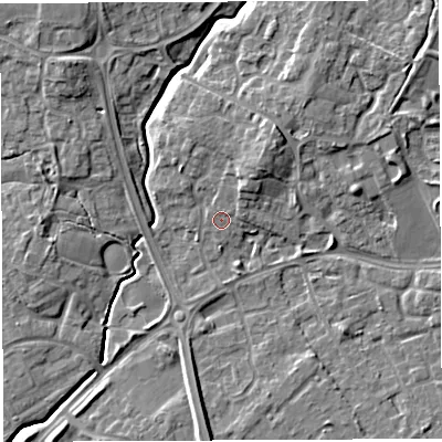 Shaded relief map of the ground around WA20DP, computed from Environment Agency LiDAR. The ground here sits at about 12 m above sea level and falls 8 m across the surrounding 800 m. Surface water reaching this point runs off ground lying to the north-north-east, 2.6 m higher.