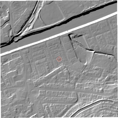 Shaded relief map of the ground around WA42UH, computed from Environment Agency LiDAR. The ground here sits at about 12 m above sea level and falls 28 m across the surrounding 800 m. Surface water reaching this point runs off ground lying to the south, 3.2 m higher.