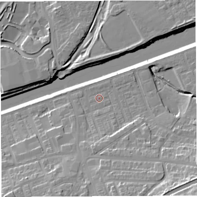 Shaded relief map of the ground around WA42UP, computed from Environment Agency LiDAR. The ground here sits at about 12 m above sea level and falls 24 m across the surrounding 800 m. Surface water reaching this point runs off ground lying to the south, 5.1 m higher.